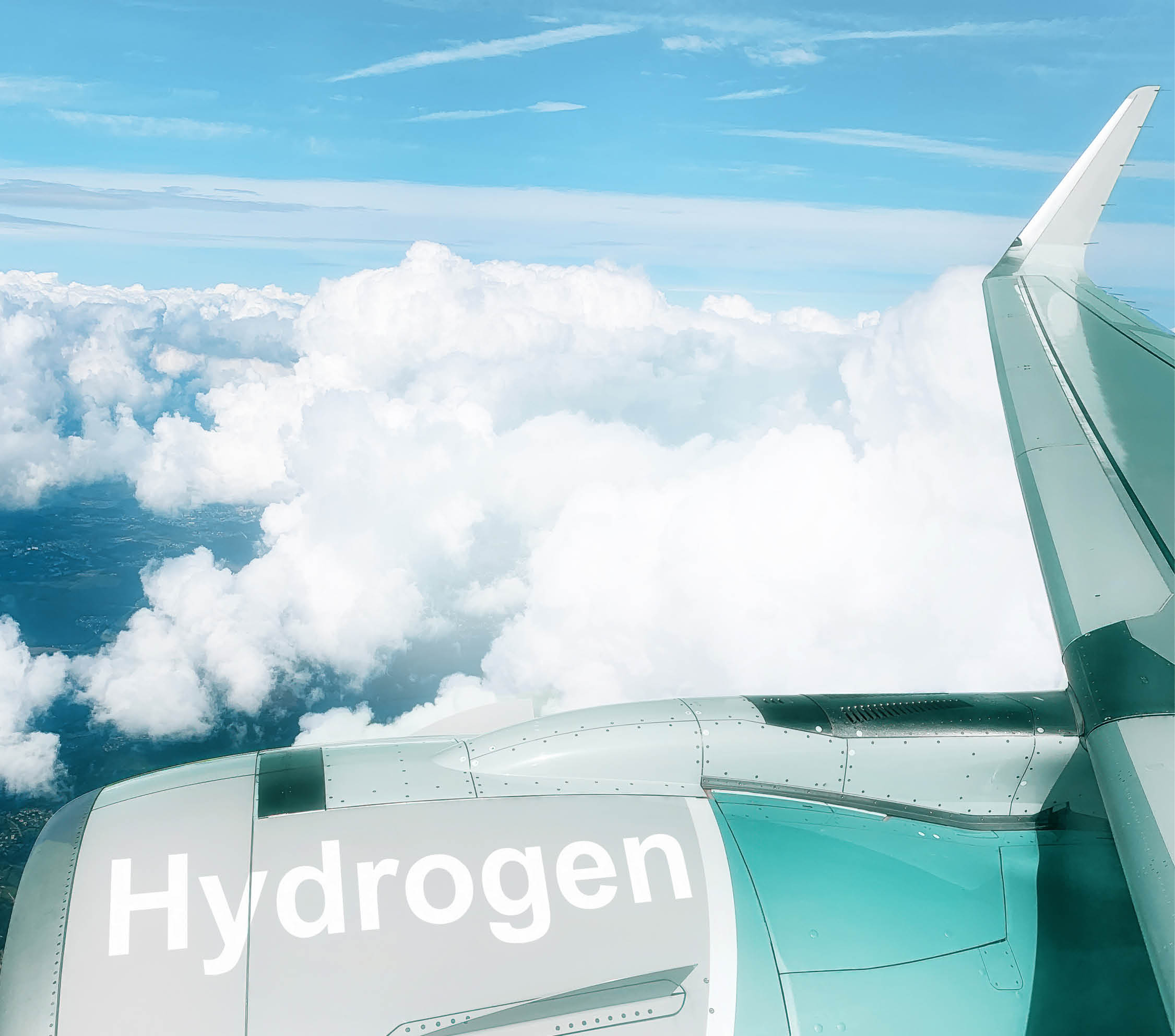 Experimental Airplane with Hydrogen H2 fuel flying high up in the clouds. Ecological and renewable fuel and power